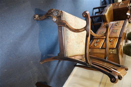 A George II red walnut elbow chair,